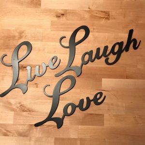 Metal “Live Laugh Love” wall hanging